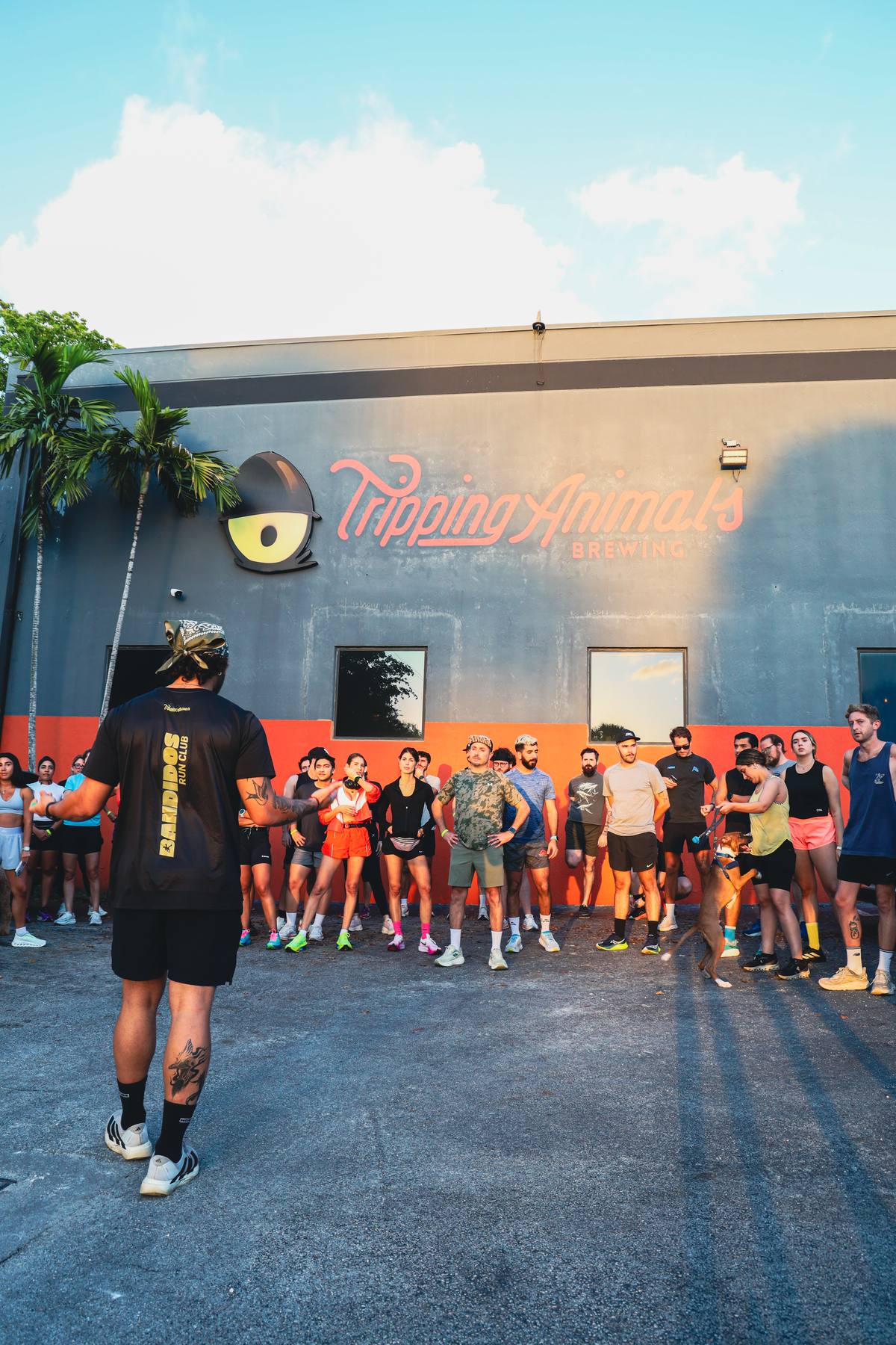 Runners gathered outside Tripping Animals Brewing before a run